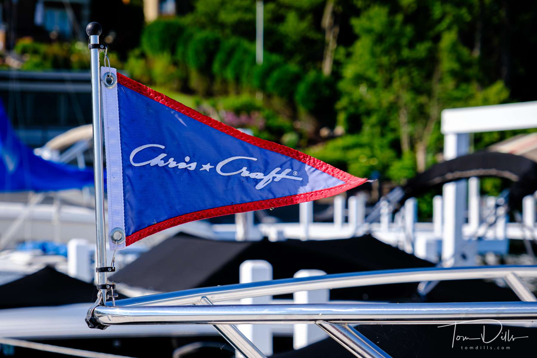 {quote}Chris Craft{quote} flag on a classic boat docked at the Geneva Inn, Lake Geneva, Wisconsin