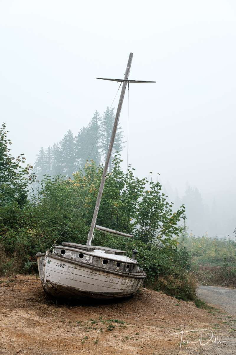 Abandoned sailboat along North River Road along Foster Reservoir near Foster, Oregon