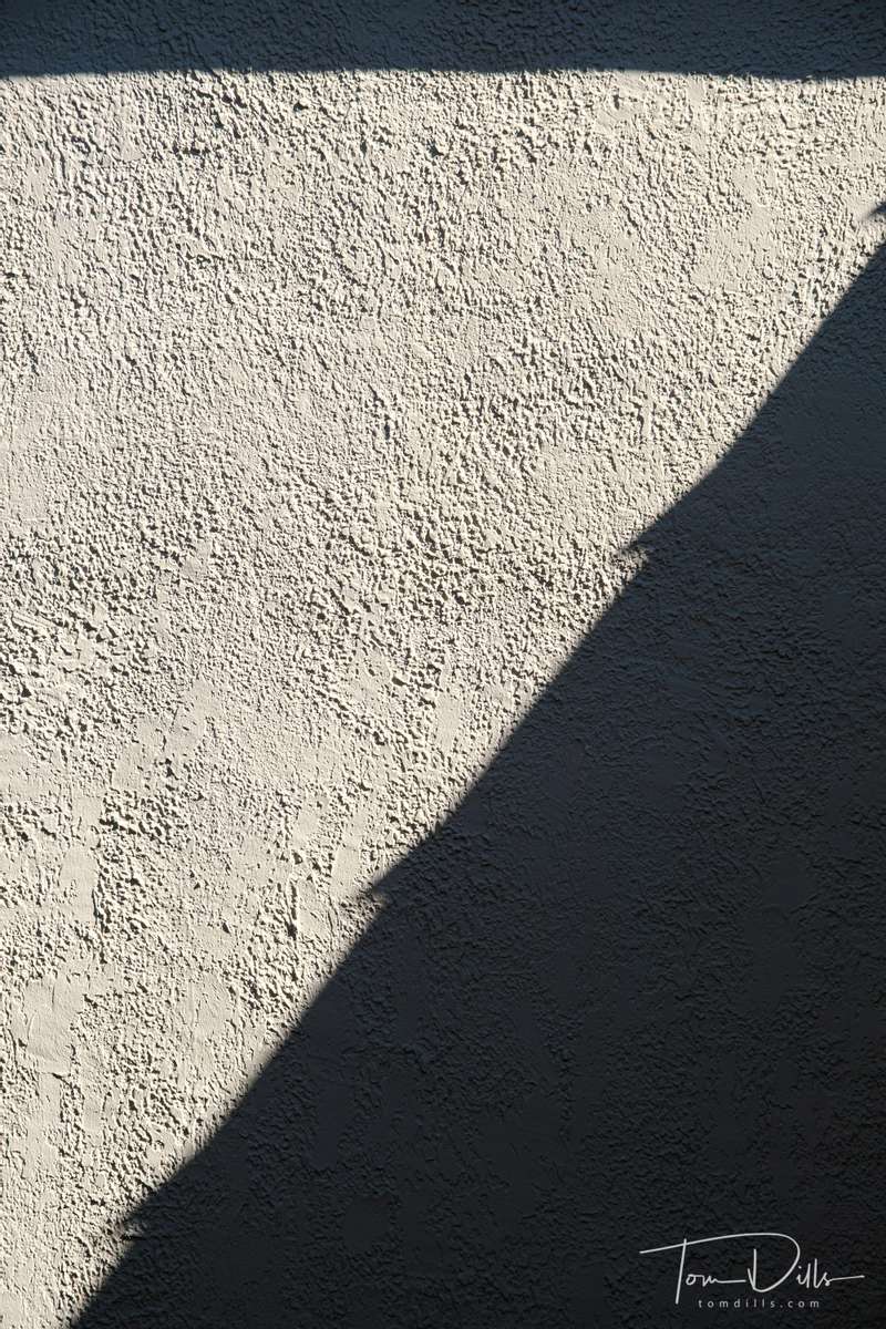 Roof shadows on a wall