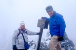 At the summit of Mount Washington, New Hampshire - 6,288 feet. 30 degrees, 40 mph wind and blowing freezing rain!