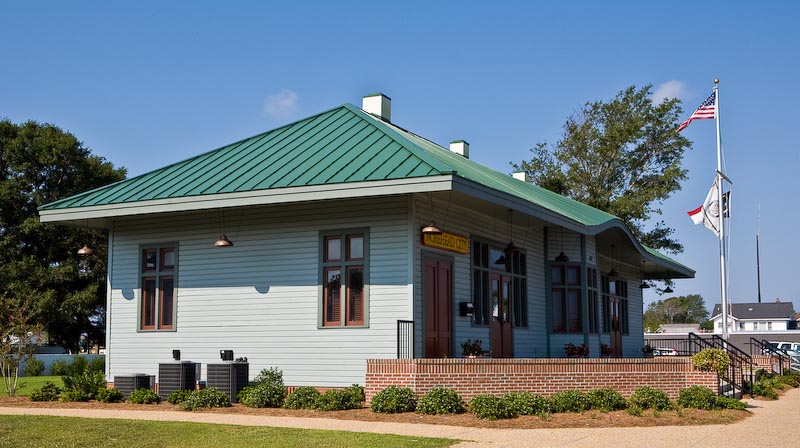 Former train station in Morehead City, North Carolina.  Restored and now operates as a municipal building and community center.