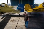 Farm Air Flying Services co-owner Bill Porter with two of the aerial application, or crop duster planes in the fleet. Farm Air’s origins lie in the days after World War II but its future is uncertain: Sacramento’s sprawl is slowly filling up traditional rice acreage, drying up demand for crop dusting services. Meanwhile, Porter has no apprentice to carry on the business when he retires—a common problem across the aerial-application industry.