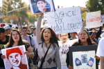 Rosiee Meraz, center, marches towards the Sonoma County Sheriff's offices during a protest over the death of Andy Lopez in Santa Rosa on Tuesday, October 29, 2013. (Conner Jay/The Press Democrat) 