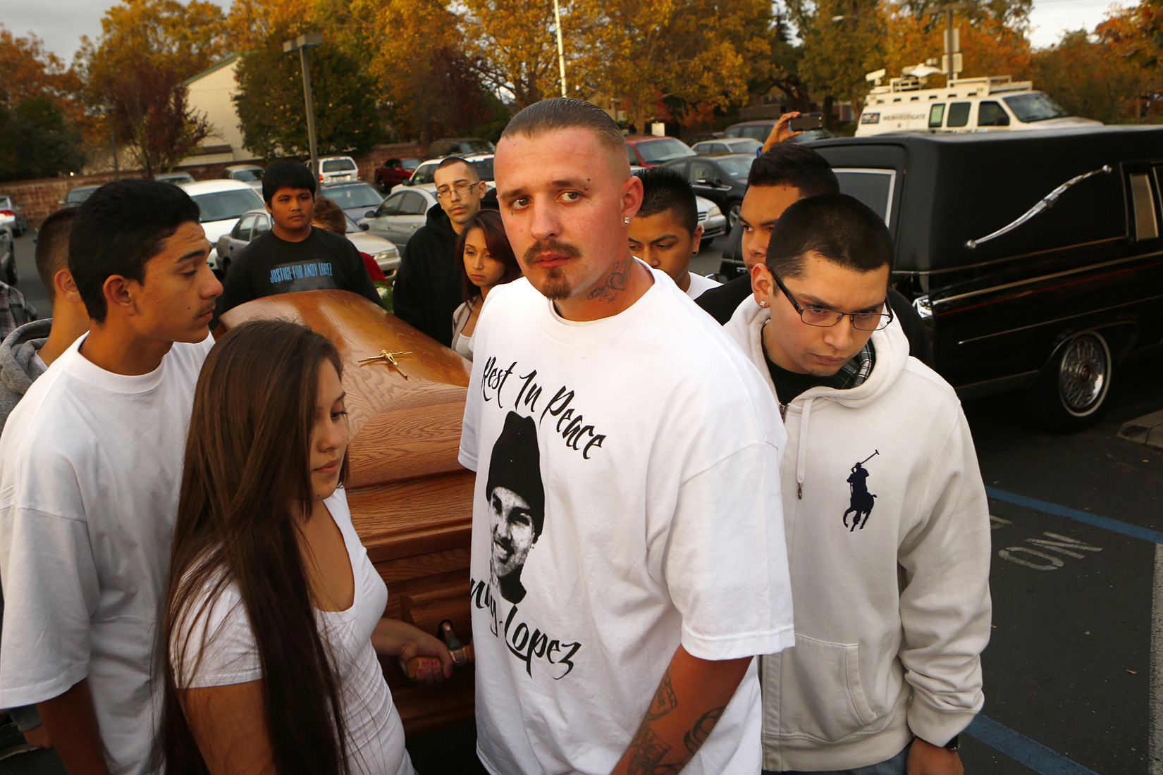 Friends of Andy Lopez carry his coffin into Resurrection Parish during his funeral ceremony in Santa Rosa on Tuesday, October 29, 2013. (Conner Jay/The Press Democrat) 