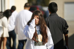 Aliyah Martinez wipes away tears after leaving a memorial service and viewing of Andy Lopez at the Windsor-Healdsburg Mortuary on Sunday afternoon in Windsor, October 27, 2013. (Conner Jay/The Press Democrat) 