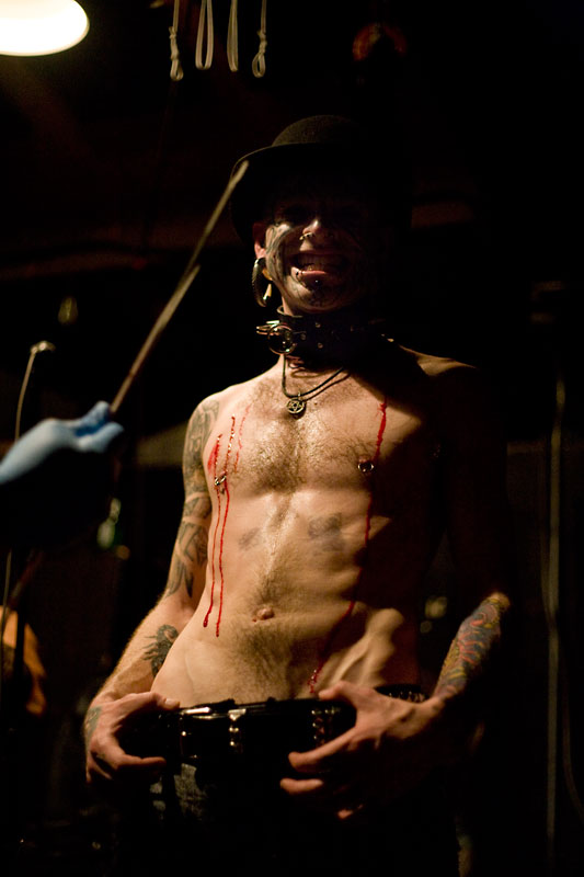 Alex from the band Pistol Whipped Prophets ends his performance with two spears inserted through chest. 