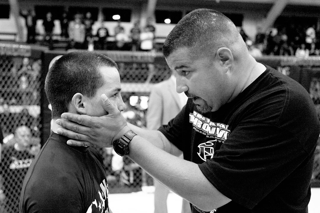 Local promoter Michael MacNeill consoles Dustin Moore of Santa Cruz after Moore suffered a loss to Jose Marin of Salinas in the Central Coast Throwdown in Salinas. {quote}You fought your ass off and just gave these people a hell of a show,{quote} said MacNeill. 