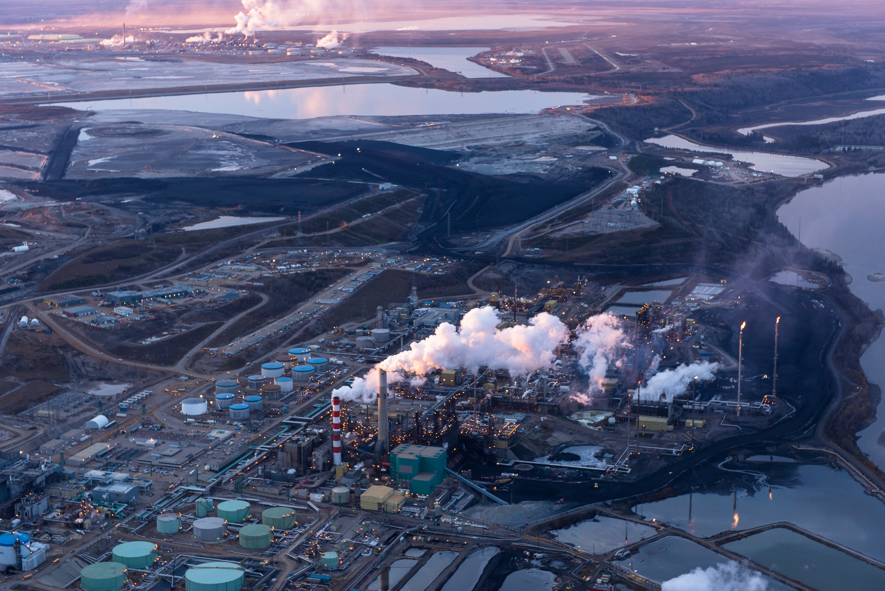Suncor amd Syncrude Upgraders, mines, tailings ponds, and Athabasca River. Alberta Oil/Tar Sands, Northern Alberta, Canada.Fine Art Print Price ListOpen and Larger Edition Prints. These are produced to the same high standards as our limited edition prints and offer collectors a more affordable way to get to know our work.Prints  are limited to an edition of 50 in each size above 20” X 24”. Prices are for prints only and do not include tax or shipping.All prices are in US dollars.12”x18” 					$350.16”x24” 				       $650.20”x30” 					$1000.24”x36” 				       $1500. 30”x45” 					$2300.40”x60”				      $3600