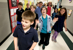 April 7, 2016 - Lori Pound, 11, reacts with joy as she and the rest of her fifth grade class at Farmington Elementary during a scavenger hunt through the halls during Autism Awareness Week at the school. Pound has been diagnosed with Asperger syndrome, an autism spectrum disorder. The school has an above average number of student with autism and held an awareness week not only to inform students about the disorder but also to honor the students who have it. (Mike Brown/The Commercial Appeal)