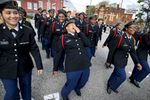 November 11, 2015 - Overton High School sophomore Keona Demesma, 15, laughs while the school's ROTC lines up and practicing before the start of the annual Veteran's Day parade through downtown Memphis. (Mike Brown/The Commercial Appeal)