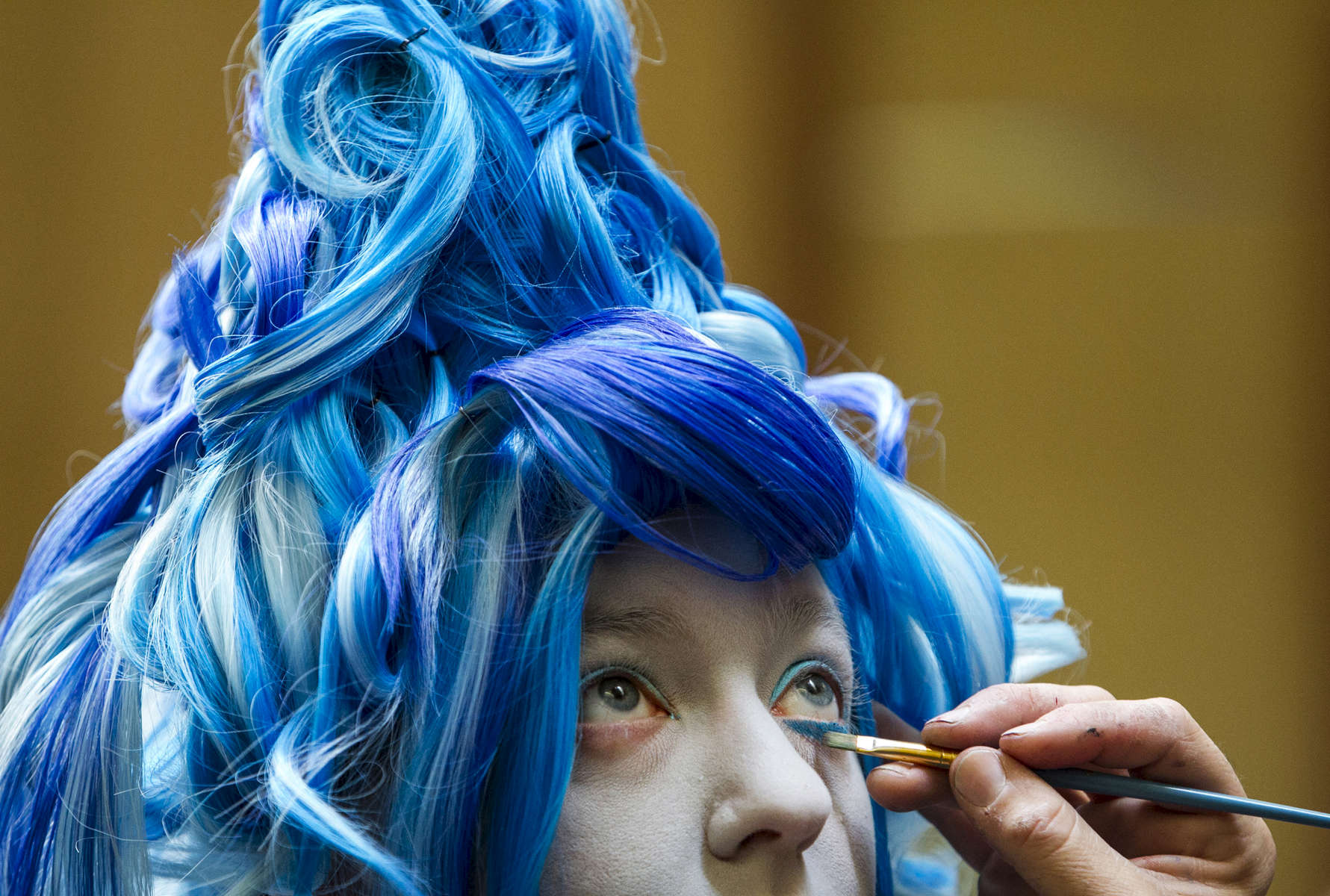 November 22, 2015 - Meagan Cross gets into character as a female version of Hades from Disney's Hercules with help from A.G. Howard, from Howardart Studios, during the final day of the sixth annual Memphis Comic and Fantasy Convention at Hilton Memphis. (Mike Brown/The Commercial Appeal)