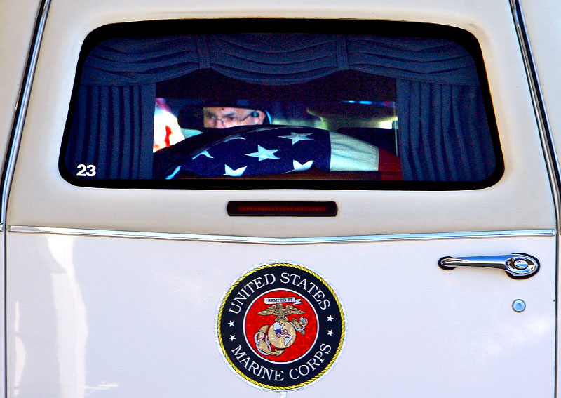 The casket of Marine Sgt. Garrett Misener prepares to be driven from Wilson Air Center. The funeral service for the 25-year-old Marine squad leader, who died early last Monday in Afghanistan after he was wounded by an improvised explosive device while on patrol in Helmand province, will be held today (Monday January 3) at Bellevue Baptist Church, 2000 Appling. (Mike Brown/The Commercial Appeal)