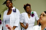 FEELING THE SPIRIT:At times you can feel the floor shaking beneath your feet when the Greater Community Temple Choir performs during a Sunday service in East Memphis, where member Shawana Brasswell(right) feels the spirit during worship. The influence of gospel sounds and styles permeates all genres of music in Memphis. 