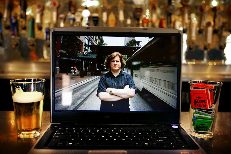 Paul Ryburn blogs about downtown life on his website (paulryburn.com/blog). Here his laptop sits on the bar at what he calls his Second Street Branch office, better known as the Flying Saucer.(Mike Brown/Memphis Commercial Appeal)