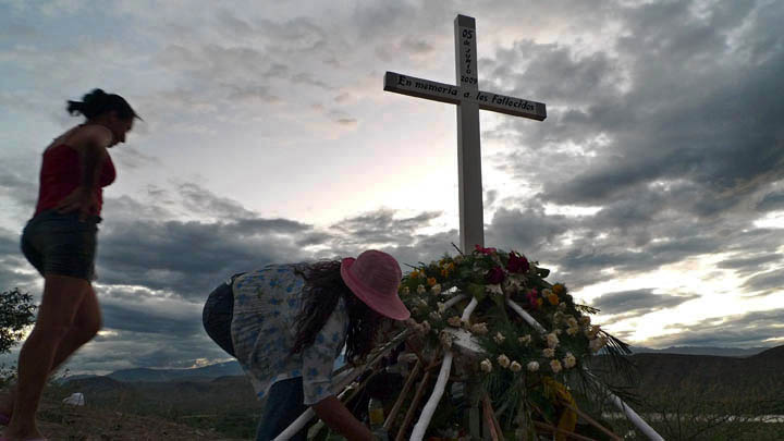 Mourners pay their respects to those killed in a clash with the Peruvian national police. 