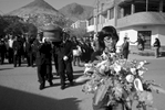 Afro-Peruvians carry the casket of Pedro Gregorio Moran Ramirez, 75, a wine and pisco maker, escorted by his family and friends. 