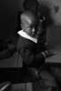Ebsen Onyango, 4.5-yrs. old, sits at her desk during class. 