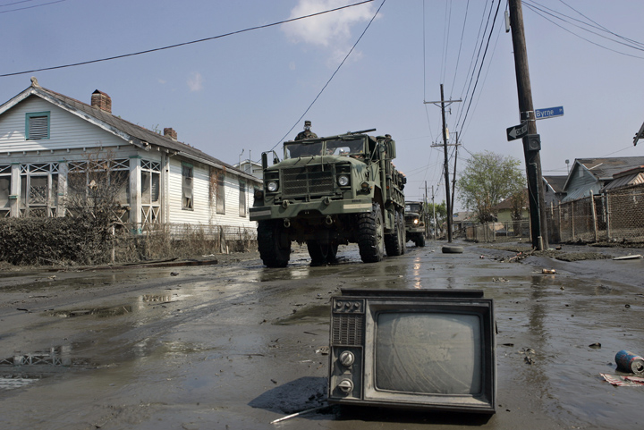 September 14, 2005 - New Orleans, Louisiana - A military truck moves along an abandoned street in the Ninth Ward.