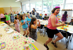 Kensington Road Elementary School teacher Pam Laurent leads third-graders in a dance party minutes before dismissal on the last day of the school year Thursday, June 26, 2014. Glens Falls elementary students were dismissed at 9:30 a.m. Thursday, which gave them just enough time to receive their report cards, get their yearbooks signed by classmates and teachers, and have a little fun before the beginning of summer break.(Jason McKibben - jmckibben@poststar.com)