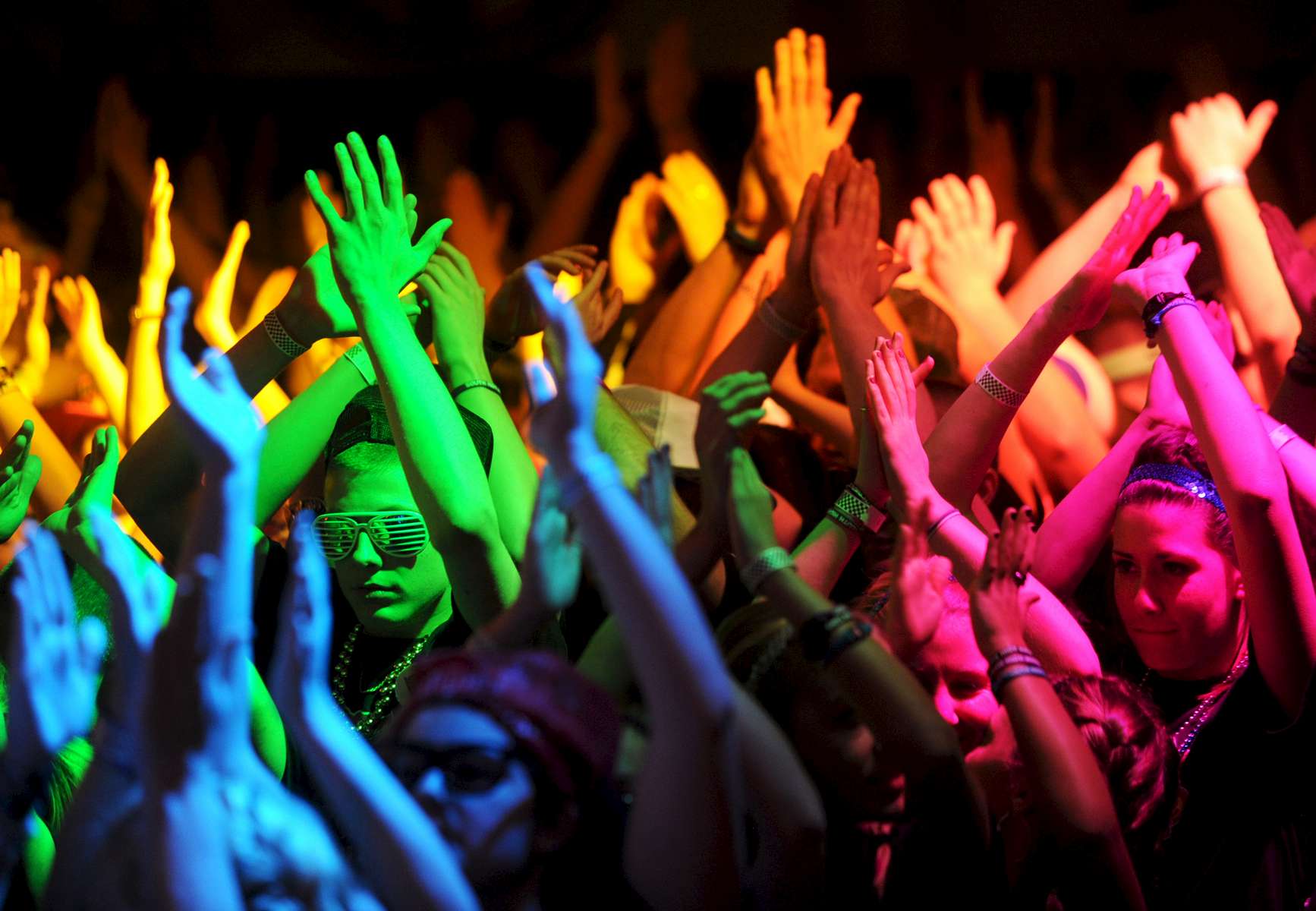 Jason McKibben - jmckibben@poststar.comSouth Glens Falls students are bathed in colored light as they participate in the 35th annual South High Marathon Dance on Friday, March 2, 2012. Hundreds took part in the charitable event that runs for 24 hours and raises money for causes and individuals selected by a student planning committee. Over $2.75 million has been raised over the previous 34 years, and organizers are hoping the total this year will top the $326,213.58 brought in last year.