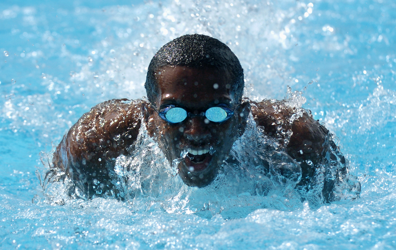 Mark Cox of Venice High competes in a 100-yard butterfly preliminary heat at the Masters Tri-County swim meet Saturday, September 27, 2008 at the Selby Aquatic Center in Sarasota.