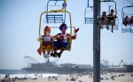 {quote}Fluffy{quote}, Laverne Fox (left) and {quote}Silly Willy{quote} Bob Krisby, both of Florida wave to onlookers from atop the Skyride along the Seaside Heights Boardwalk. Photographed for The Star-Ledger