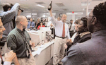 Star-Ledger Editor Jim Willse holds up champagne after the announcement of The Pulitzer Prize.