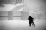 A boy navigates his way home in a blizzard which struck the Jersey Shore, dumping 2 feet of snow in 24 hours. 