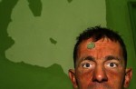 A patient slams a Bulgarian coin on his forehead and says, “Money controls everything. Money is why I am here. Money is why I will never get out. We have no voice here; only money speaks,” in the psychiatry ward of a county hospital in Bulgaria on August 10, 2006. 