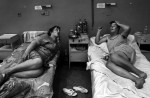 Female patients talk about their family lives and about dealing with manic depression in the psychiatry ward of a county hospital in Bulgaria on August 23, 2007. 