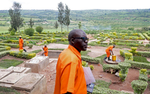 Prisoner of 22 years Gregoire Nsengiyumva, 53, talks about the biogas digester system he helped design (within the cement containers on left and right) at Rwamagana Prison in Rwamagana, Rwanda, on November 18, 2017. All of Rwanda's prisons use their prisoners' waste - in addition to that of cows - to fuel their kitchens via biogas. At Rwamagana, biogas is used to cook corn, and peat cooks rice and beans. Many prisoners say they can usually tell when biogas is used due to the lack of smokey flavor in food. Nearly half of all Rwandans live in poverty, relying on small-scale farming for survival without gas or electricity. With so many women and children spending hours of the day foraging for wood used for cooking and light, often damaging their eyes, lungs, the forests and atmosphere, a little inventiveness helps. Enter cow and enter pig -- not just as a source of food, but also the heat needed to cook it. Or more specifically, their poo -- the fuel fed to a biogas digester, a tank that converts organic waste into methane. 