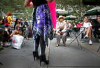 People gape at a high-heeled fashionista outside of the Bryant Park tents on Thursday, September 10, 2009 during the Spring 2010 Mercedes-Benz Fashion Week in Manhattan, New York.  (For The New York Times)