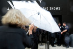A crowd enters the 360 W. 33rd St. venue on a rainy first day of New York Fashion Week in Manhattan, NY on September 10, 2015.(For The New York Times)