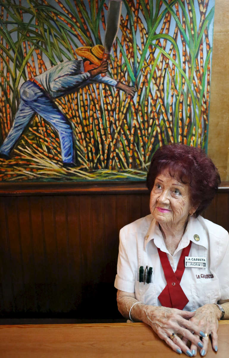 Aida Andreu, a Republican in Miami, FL, poses for a portrait in the restaurant where she works, La Carreta, on March 11, 2016. She says she would like to vote for U.S. Presidential candidate Donald Trump (R-NY) in the state's Tuesday primary because she believes he is capable of changing America for the better. As far as Ted Cruz (R-TX) or Marco Rubio (R-FL), she says she does not believe either to be ready for a presidency, and is not influenced by their Cuban roots. (For Washington Post)