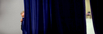 (L-R) Actor John Voight peeks out behind the curtains, from which U.S. Presidential hopeful Rudy Giuliani (R-NY) is about to enter a rally with him and former FBI director Louis J. Freeh at the Fantasy of Flight museum in Polk City, Florida, on Sunday, January 20, 2008; and an American flag sits folded on a chair backstage as U.S. Presidential hopeful Sen. Hillary Clinton (D-NY) speaks at the Bluegrass Cafe in Tama, Iowa, on Nov. 19, 2007. (Photo by: Yana Paskova for The New York Times)