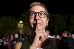Pam Becker, 51, poses for a portrait with the name of U.S. Presidential candidate Bernie Sanders (I-VT) written on her finger at a rally for candidate Donald Trump (R-NY) at Sunset Cove Amphitheater in Boca Raton, FL, on March 13, 2016. Becker, a Democrat, says of her attendance to a Trump rally: {quote}It's hard to argue against someone if I don't have the knowledge. Simply calling people names is not an argument.{quote} (For TIME magazine)