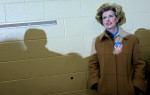 Mary Beth Browder poses for a portrait while Republican Presidential candidate Mitt Romney (R-MA) speaks at a rally at West Hills Elementary School in Knoxville, Tennessee on Sunday, March 04, 2012. (For The New York Times)