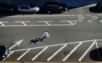 In a world that has paused its humans, humans reclaim the asphalt; a skateboarder soars above an emptied avenue in Brooklyn, NY on April 06, 2020. 