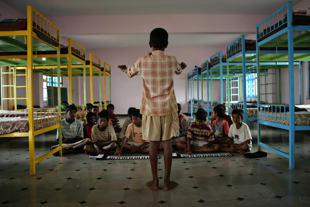 Thirteen-year-old Santosh leads the weekly music class on donated keyboards. {quote}We have every kind of people here at Morning Star, snake killing people, music people, dancing people. Some people go out for music and movies. I just thank God I am getting everything here in one house,{quote} Samson said.