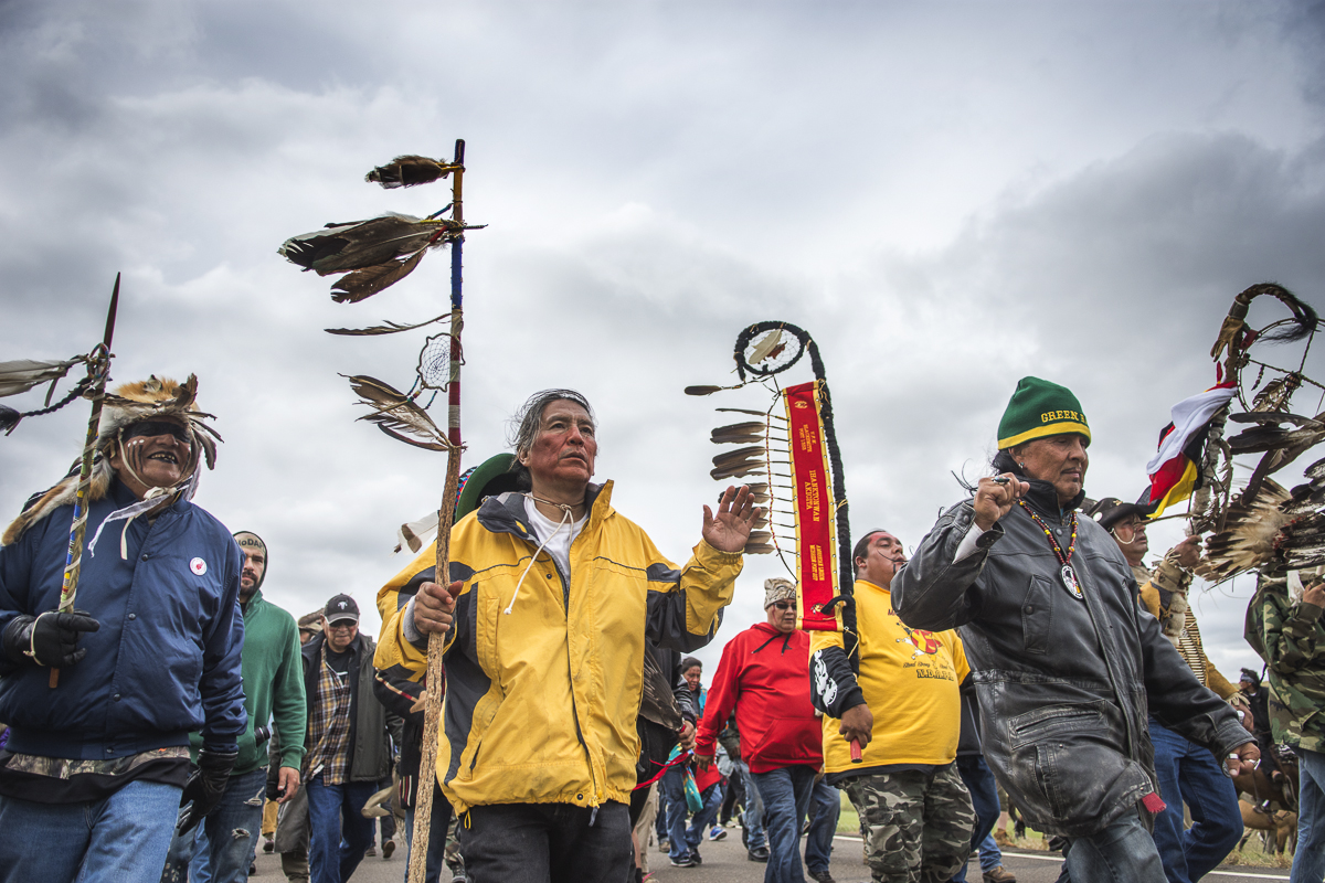 Military veterans lead a march from the main camp at Standing Rock North Dakota to the {quote}Frontlines{quote} where they are opposing the construction of the Dakota Access Pipeline.