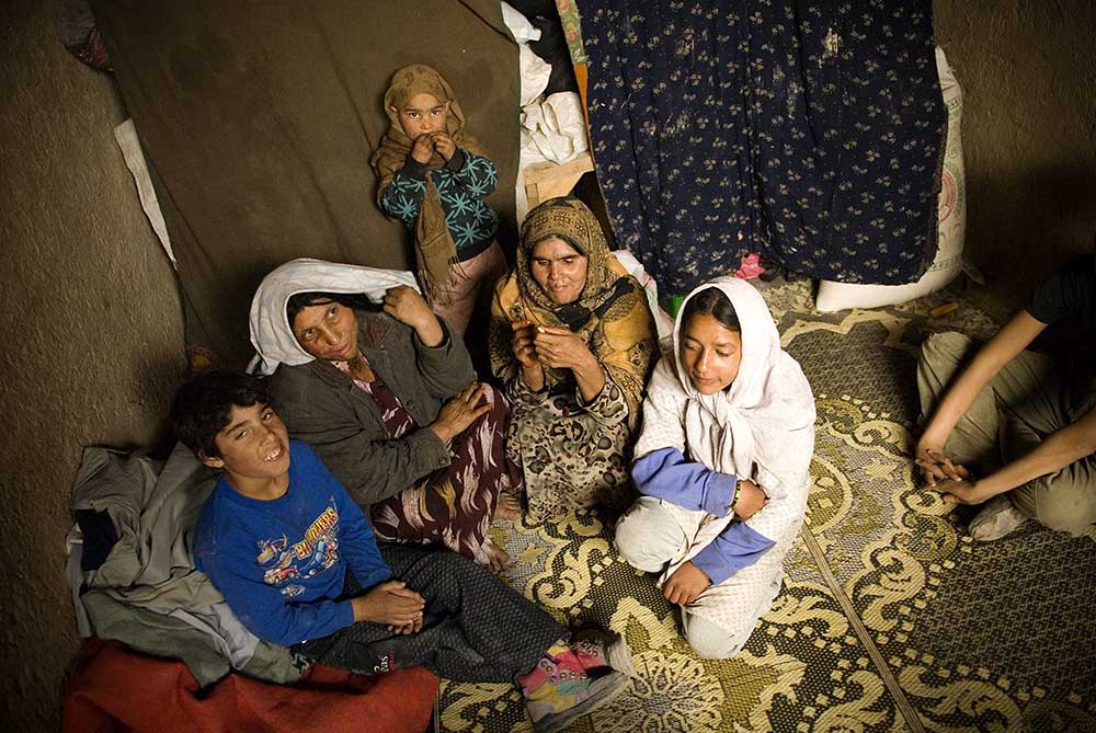 At Zohr Abab Wasi, this family has given AWEC permission to use their small one room home as a classroom twice a week, to teach basic literacy to the children in the camp.