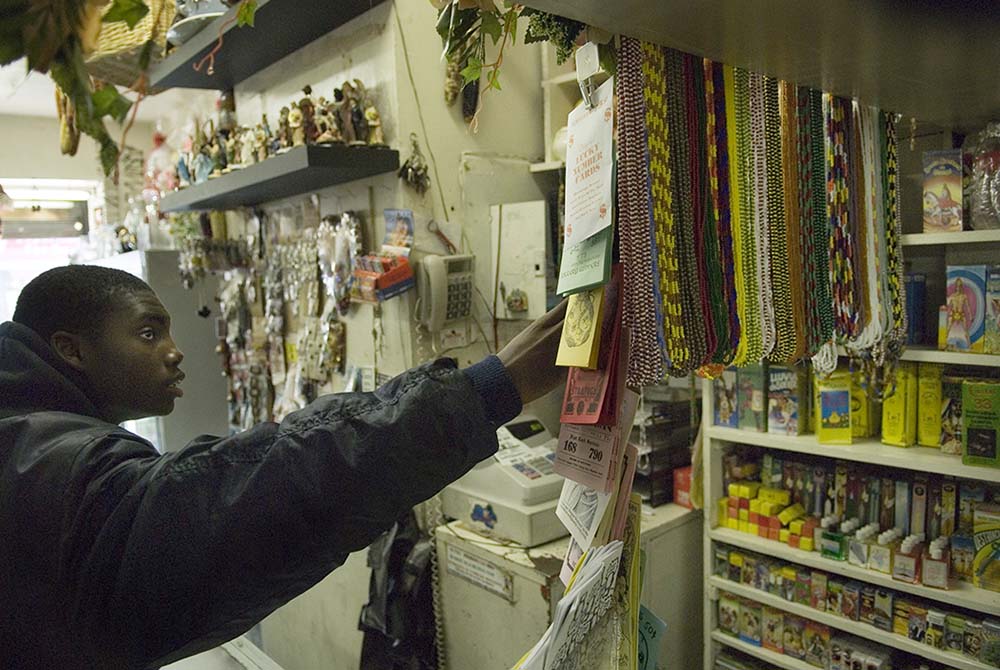 A young man shops for beads at Santa Rosa.