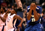 Memphis's Elliot Williams holds his head in frustration after missing the potential game winning shot at the end of the game between the Memphis Tigers and Kansas Jayhawks at the Basketball Hall of Fame Classic in the Scottrade Center in St. Louis, Mo. Tuesday November 17, 2009.