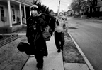 Richard Skinner and Ashley Johnston walk to Johnston's home to wash his clothes and shoot heroin in St. Louis on Monday, Feb. 6, 2017. Johnston and Skinner have a 12-year-old child together that is cared for by Johnston's mother. The two are still attracted to each other but Johnston is currently six months pregnant with another man's child.
