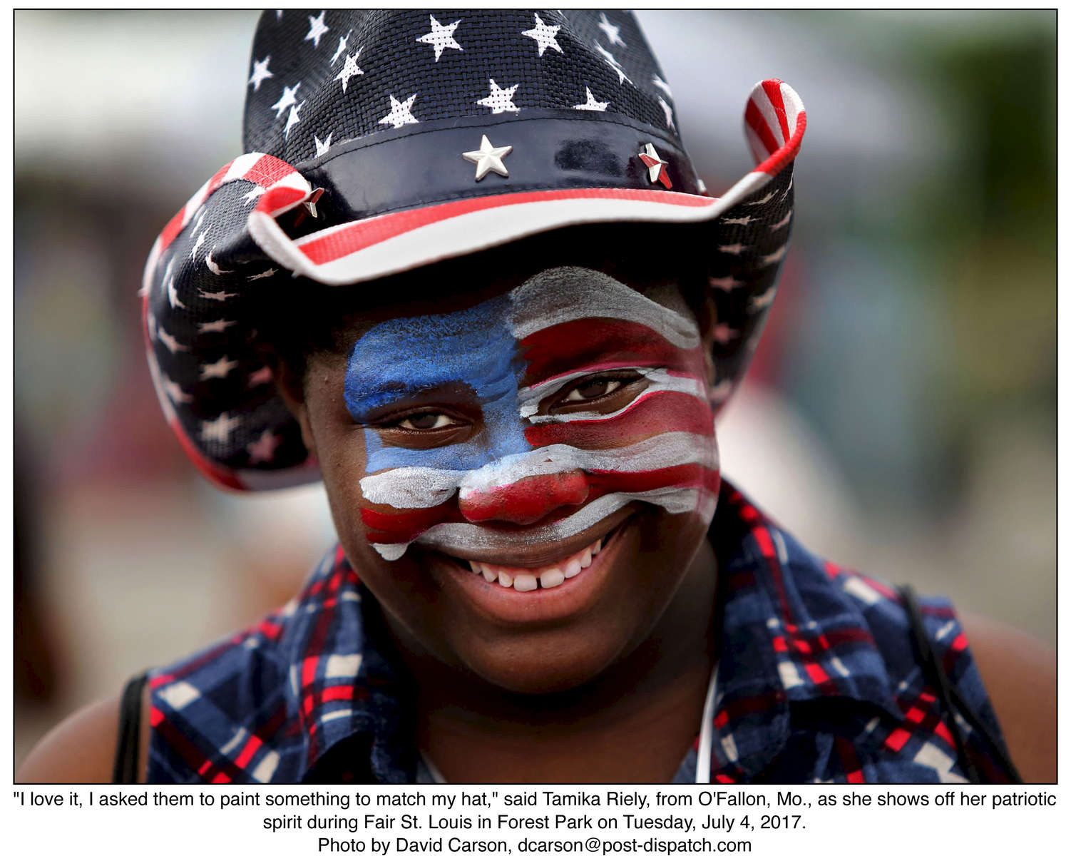 {quote}I love it, I asked them to paint something to match my hat,{quote} said Tamika Riely, from O'Fallon, Mo., as she shows off her patriotic spirit during Fair St. Louis in Forest Park on Tuesday, July 4, 2017. Photo by David Carson, dcarson@post-dispatch.com