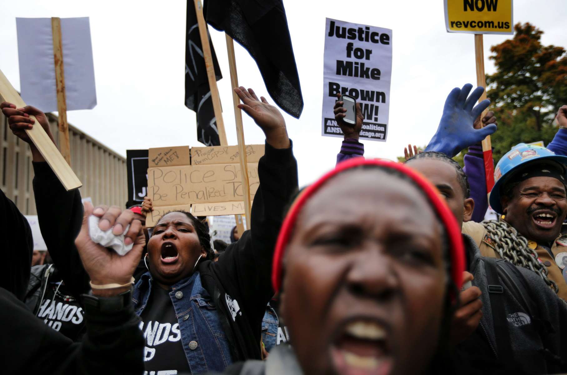 People chant before the start Ferguson October march in downtown St. Louis on Saturday, October, 11, 2014.  Thousands of people took part in the march down Market Street and rally in Kiener Plaza.