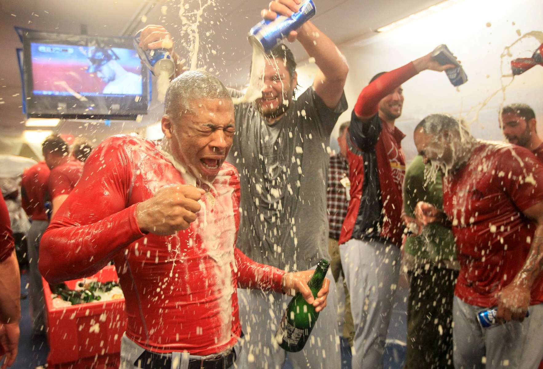 Adron Chambers, left, is doused with beer by pitcher Lance Lynn, center, in the locker room after the Cardinals won game five of the NLDS between the St. Louis Cardinals and Philadelphia Phillies at Citizens Bank Park on Friday, October 7, 2011 in Philadelphia.Photo by David Carson, dcarson@post-dispatch.com