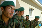 Afghanistan Five Years Later-Afghan National Army--Members of the Afghan National Army gather outside their barracks in Kandahar. Training the Afghan Army to stand on its own is a priority for United States but desertion and retention plague the Afghan Army.