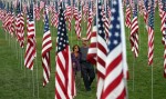 Click here to watch video-- Two hundred and sixty volunteers swarmed Art Hill on Saturday morning staking 2996 flags into the ground.  On Sunday three different memorial services at the site will mark the 10th anniversary of 9/11 terrorist attacks. 