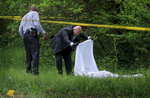 Police investigate the scene of a triple homicide on 4500 block of Rosewood Avenue in Pine Lawn on Wednesday, April 26, 2017. The major case squad is investigating the shooting. Photo by David Carson, dcarson@post-dispatch.com